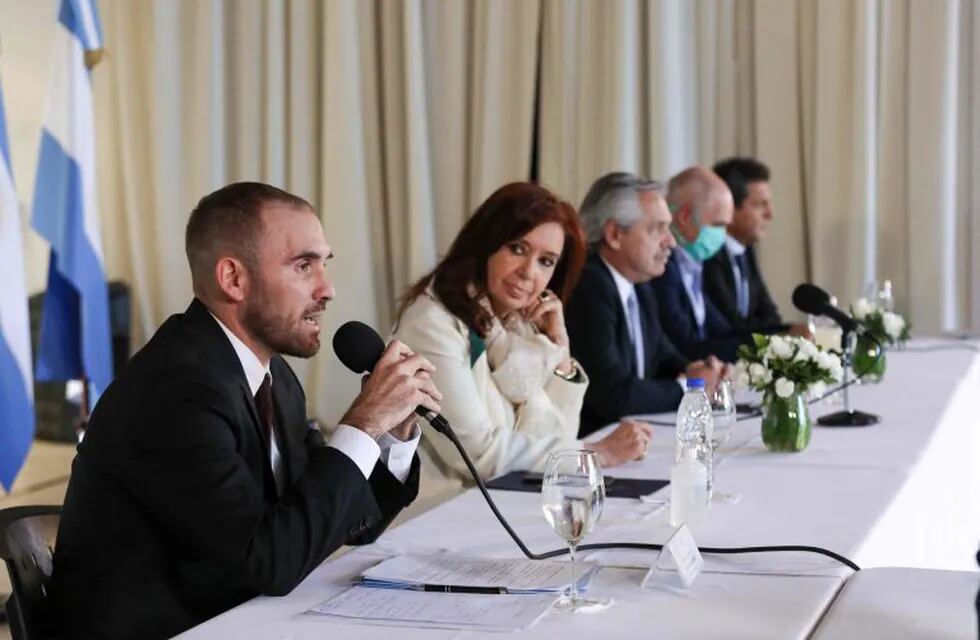 Handout photo released by Argentina's Presidency of the Economy Minister Martin Guzman (L) speaking next to vice-president Cristina Fernandez de Kirchner (2-L) Argentine President Alberto Fernandez (C,) Buenos Aires Mayor Horacio Rodriguez Larreta and legislator Sergio Massa during a working meeting with governors at the Olivos Presidential residence in Olivos, Buenos Aires on April 16, 2020. - Argentina, which is now in \