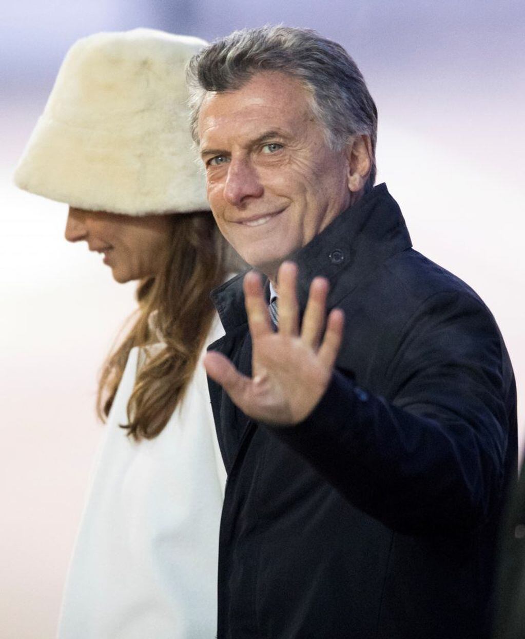 Argentina's President Mauricio Macri and his wife Juliana Awada arrive at the Vnukovo Government Airport for official visit to Russia in Moscow, Russia, Monday, Jan. 22, 2018. (AP Photo/Pavel Golovkin)