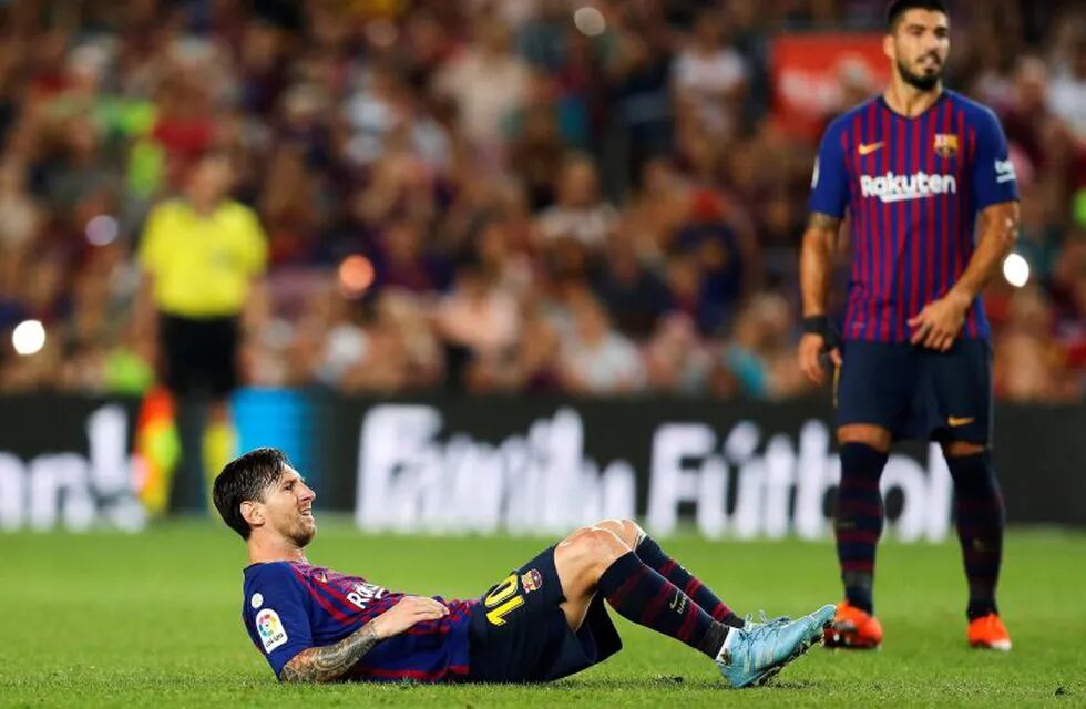 Leo Messi  y Luis Suárez, durante el partido de Liga en Primera División ante el Girona (EFE)