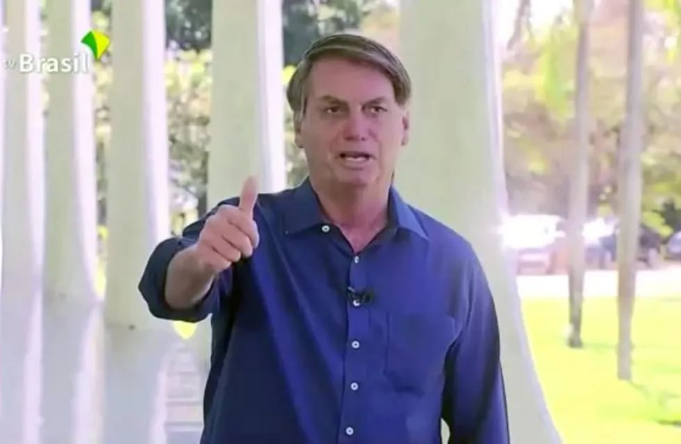 Brazil's President Jair Bolsonaro gestures as he speaks to the media on his positive coronavirus diagnosis in Brasilia, Brazil July 7, 2020 in this still image taken from video. Brazilian Government TV via Reuters TV  THIS IMAGE HAS BEEN SUPPLIED BY A THIRD PARTY. NO RESALES. NO ARCHIVES.