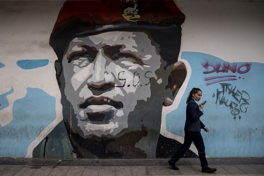 Dibujo en la pared de un edificio alusivo al fallecido presidente venezolano Hugo Chávez