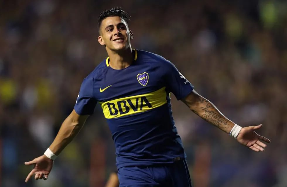 Boca Juniors' forward Cristian Pavon celebrates after scoring a goal against Colon during their Argentina First Division Superliga football match at La Bombonera stadium, in Buenos Aires, on September 27, 2018. / AFP PHOTO / ALEJANDRO PAGNI