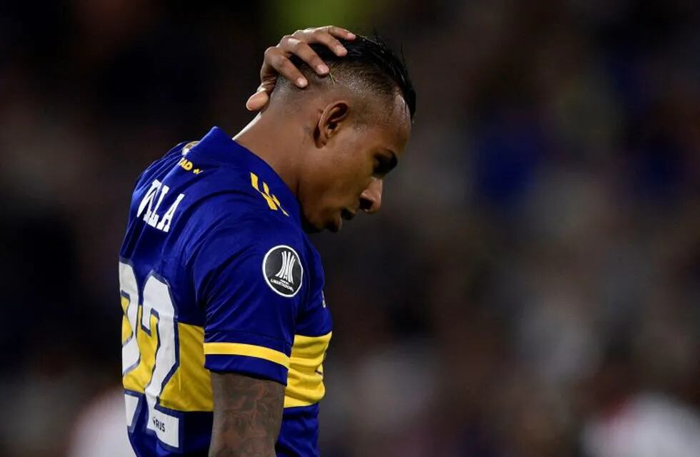 Colombian forward Sebastian Villa, of Argentina's Boca Juniors, reacts after missing a chance to score against Colombia's Independiente Medellin during the Copa Libertadores group H football match at La Bombonera stadium, in Buenos Aires, on March 10, 2020. - Boca Juniors announced on April 28, 2020 it will take the \