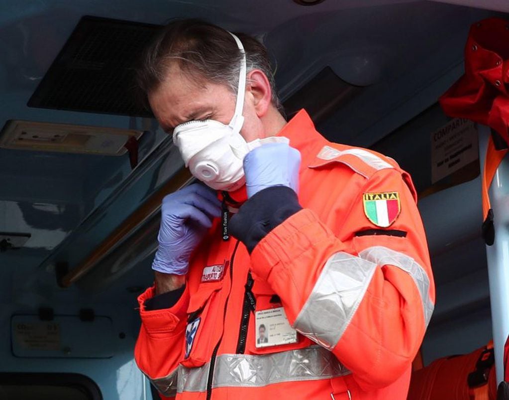 Brescia (Italy), 24/02/2020.- A nurse wearing a protective mask aboard an ambulance from the hospital's emergency room 'Poliambulanza of Brescia', in Brescia, northern Italy, 24 February 2020. Italian authorities announced on 24 February 2020 that the number of infected people with the novel coronavirus (COVID-19) disease in the country has raised to over 160, with at least four fatalities. Precautionary measures and ordinances to tackle the spreading of the deadly virus included the closure of schools, gyms, museums and cinemas in the affected areas in northern Italy. (Cine, Italia) EFE/EPA/FILIPPO VENEZIA