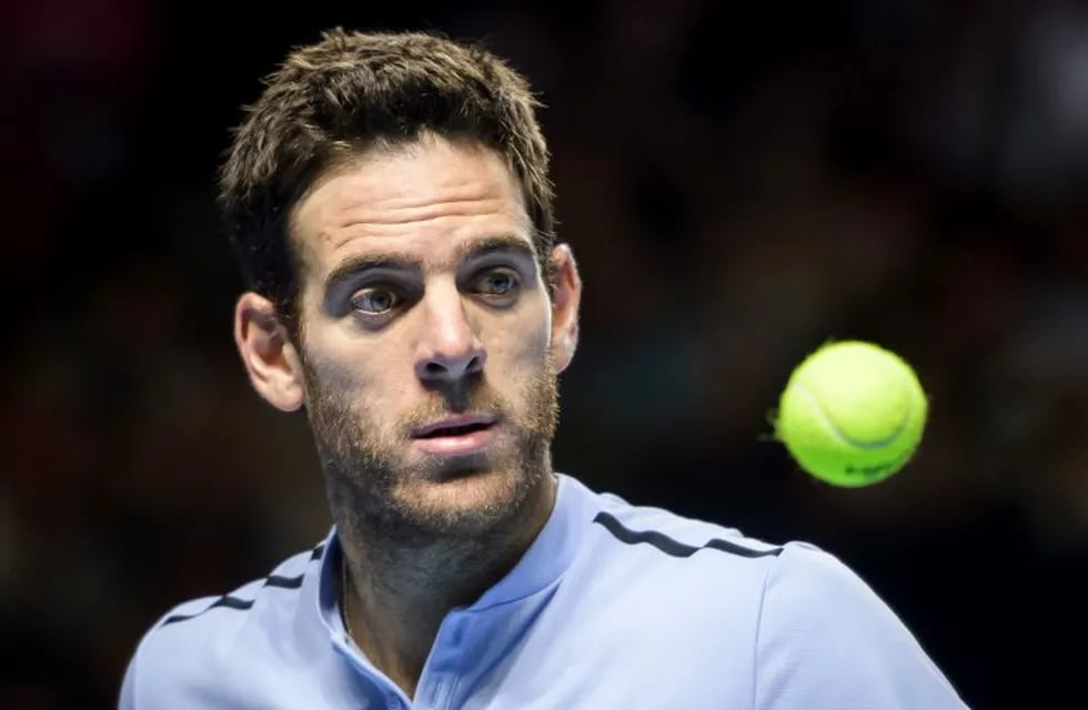 Argentina's Juan Martin Del Potro eyes the ball after winning his semi-final match  against Croatia's Marin Cilic at the Swiss Indoors ATP 500 tennis tournament on October 28, 2017 in Basel. / AFP PHOTO / Fabrice COFFRINI