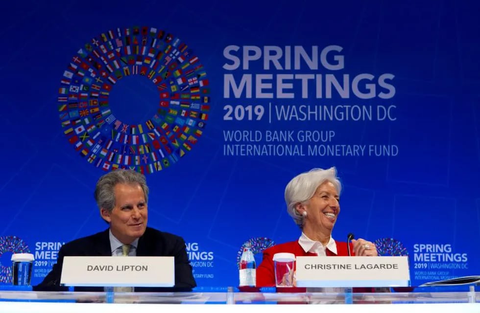 International Monetary Fund (IMF) Managing Director Christine Lagarde accompanied by Deputy Managing Director David Lipton, speak at a news conference, during the World Bank/IMF Spring Meetings in Washington, Thursday, April 11, 2019. (AP Photo/Jose Luis Magana)