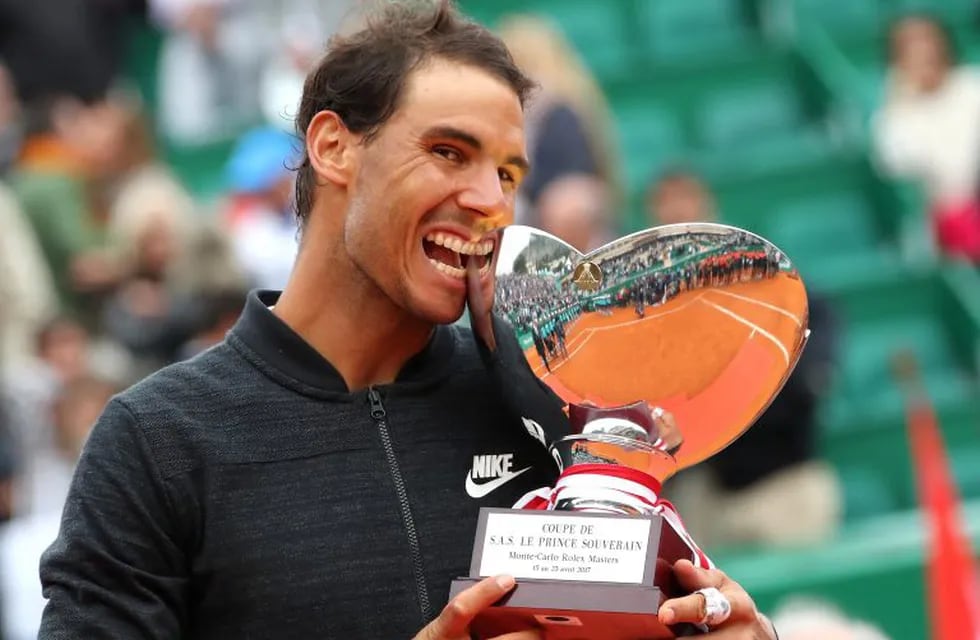 Tennis - Monte Carlo Masters - Monaco - 23/04/17 - Rafael Nadal of Spain poses with his trophy after winning his final tennis match against his compatriot Albert Ramos-Vinolas at the Monte Carlo Masters. REUTERS/Eric Gaillard