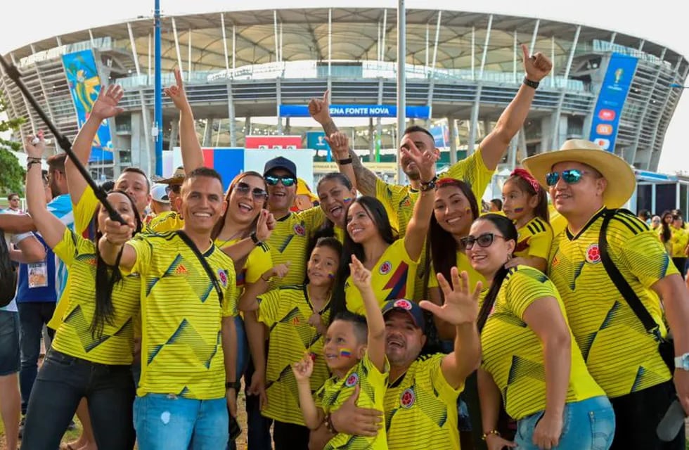 Fans of Colombia cheer before the Copa America football tournament group match against Argentina at the Fonte Nova Arena in Salvador, Brazil, on June 15, 2019. (Photo by Raul ARBOLEDA / AFP)