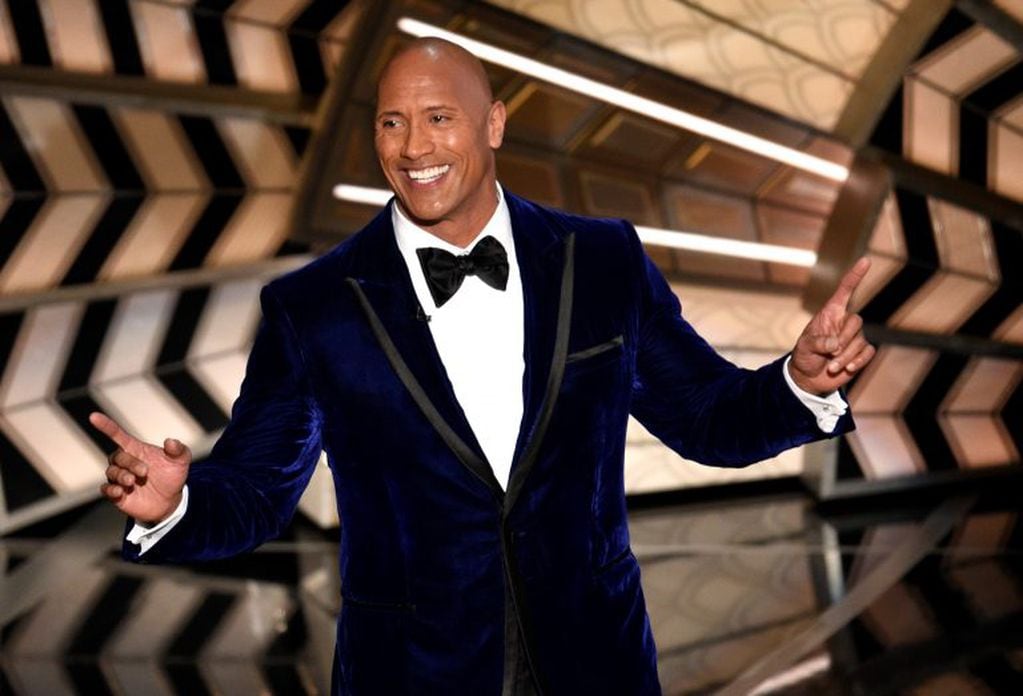 Dwayne Johnson introduces a performance from best original song nominee "How Far I'll Go" from "Moana" at the Oscars on Sunday, Feb. 26, 2017, at the Dolby Theatre in Los Angeles. (Photo by Chris Pizzello/Invision/AP)