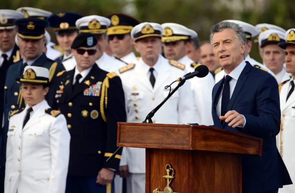 Argentine President Mauricio Macri speaks alongside members of the Navy and relatives of the 44 crew members of the missing at sea ARA San Juan submarine, during a ceremony to commemorate the one year anniversary of the tragedy in Mar del Plata, Argentina November 15, 2018.  REUTERS/Marina Devo