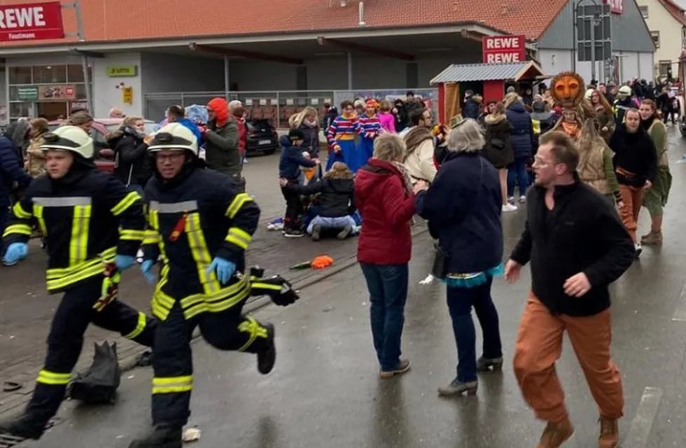 People react at the scene after a car ploughed into a carnival parade injuring several people in Volkmarsen, Germany February 24, 2020.     Elmar Schulten/Waldeckische Landeszeitung via REUTERS.      NO RESALES. NO ARCHIVES