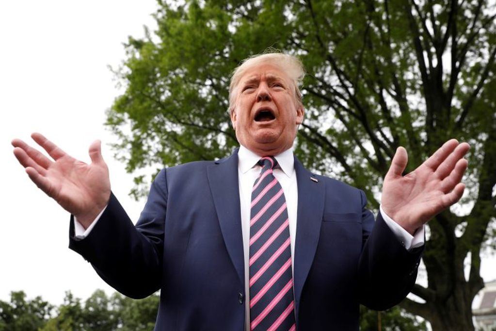 May 5, 2020 - Washington, DC, United States: U.S. President Donald Trump speaks to the media on the South Lawn of the White House in Washington before his departure to Phoenix, Arizona. (Polaris)