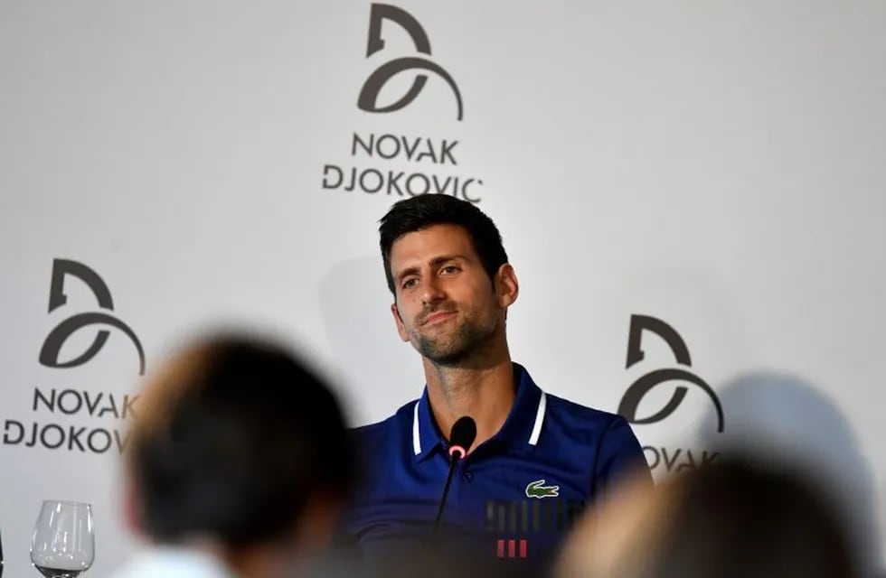 Serbian tennis player Novak Djokovic delivers a press conference in Belgrade on July 26, 2017.\nTwelve-time Grand Slam champion Novak Djokovic will miss the rest of the season with an elbow injury, he announced on July 26. / AFP PHOTO / POOL / ANDREJ ISAKOVIC