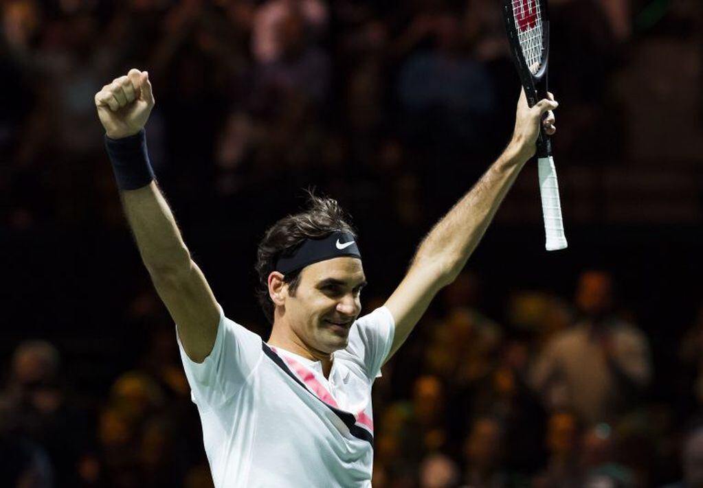 Roger Federer of Switzerland celebrates after victory against Grigor Dimitrov of Bulgaria during their men's singles final for the ABN AMRO World Tennis Tournament in Rotterdam on February 18, 2018.  / AFP PHOTO / ANP / Koen Suyk / Netherlands OUT