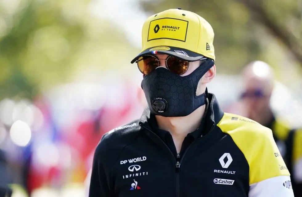 Esteban Ocon of Renault arrives with a face mask ahead of the Formula 1 Australian Grand Prix 2020 at the the Albert Park Circuit in Melbourne, Thursday, March 12, 2020. (AAP Image/Michael Dodge) NO ARCHIVING, EDITORIAL USE ONLY
