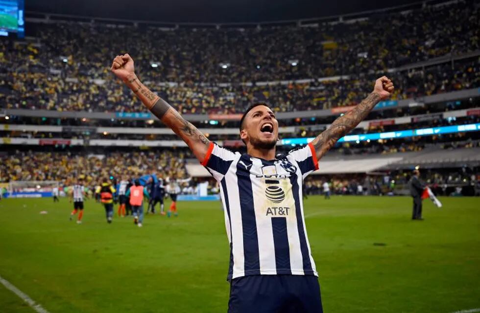 Monterrey's Leonel Vangioni celebrates after winning the Mexican Apertura Tournament final against America, at the Azteca stadium in Mexico City, on December 29, 2019. (Photo by ALFREDO ESTRELLA / AFP)