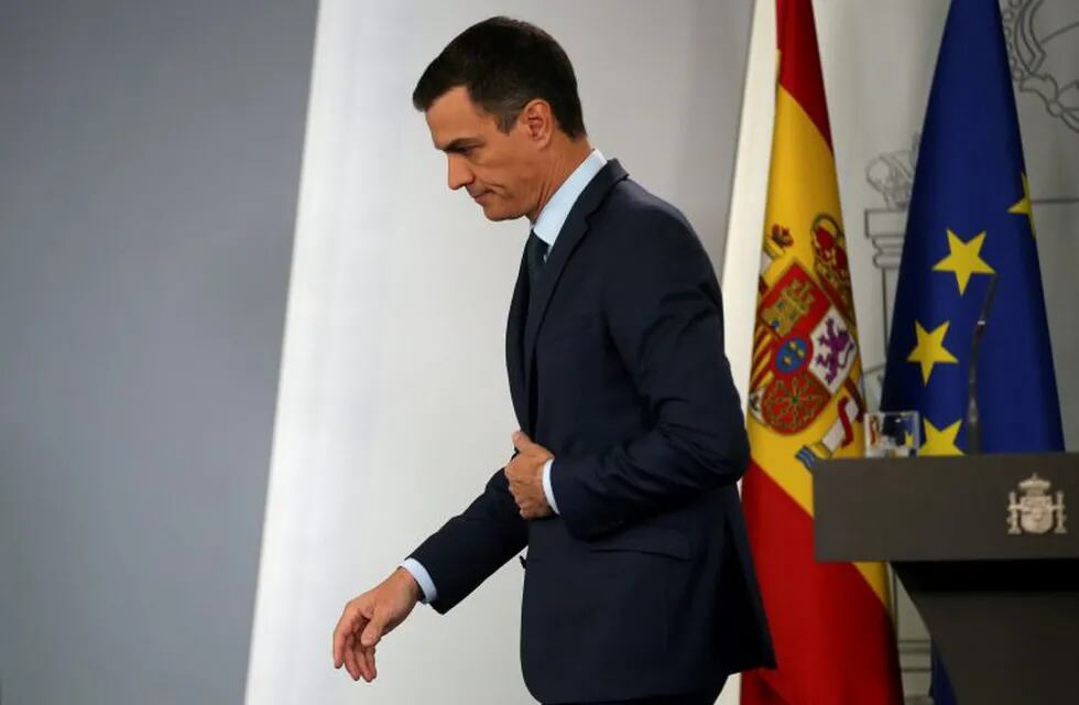 Spain's Prime Minister Pedro Sanchez leaves the podium after giving an official statement on the government's position on the political crisis in Venezuela, in Madrid, Spain, January 26, 2019. REUTERS/Javier Barbancho