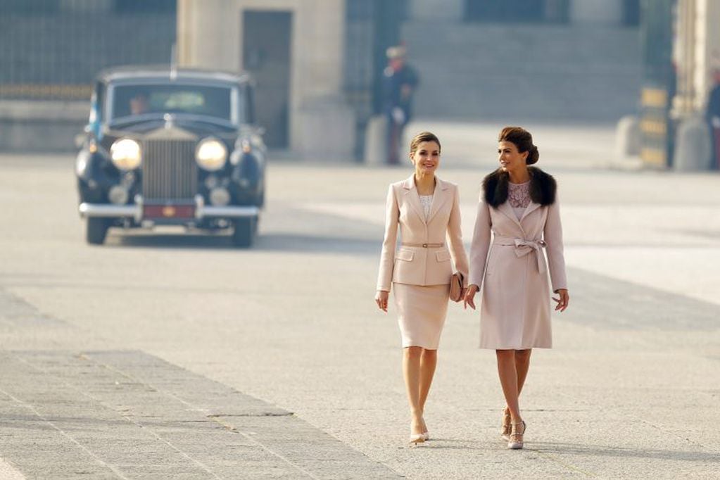 Spain's Queen Letizia, left, walks with Juliana Awada, the wife of the Argentina's President Mauricio Macri, during a welcome ceremony at the Royal Palace in Madrid, Wednesday, Feb. 22, 2017. Macri and his wife Awada are on the first of a four day officia