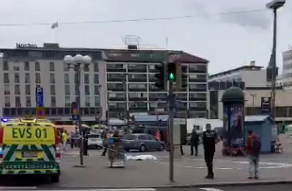 A video grab taken from Twitter on August 18, 2017 shows officials standing in a street in the Finnish city of Turku where several people were stabbed. \n\