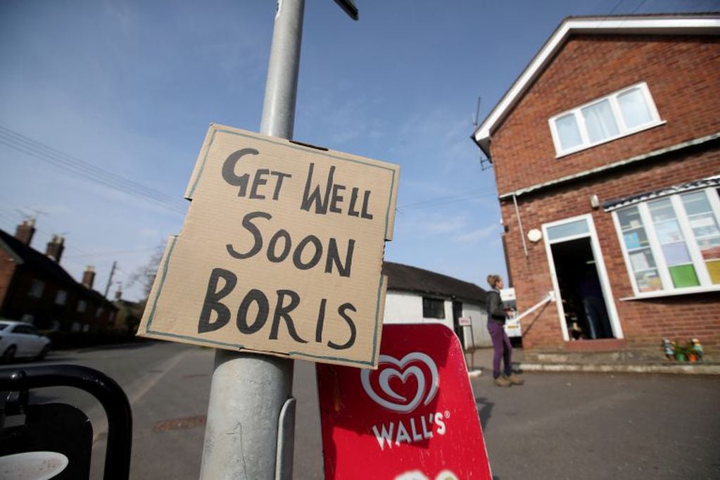 FILE PHOTO: A sign of support for British Prime Minister Boris Johnson, who has been in hospital since Monday  as the spread of the coronavirus disease (COVID-19) continues, in Swynnerton, Britain, April 9, 2020. REUTERS/Carl Recine/File Photo