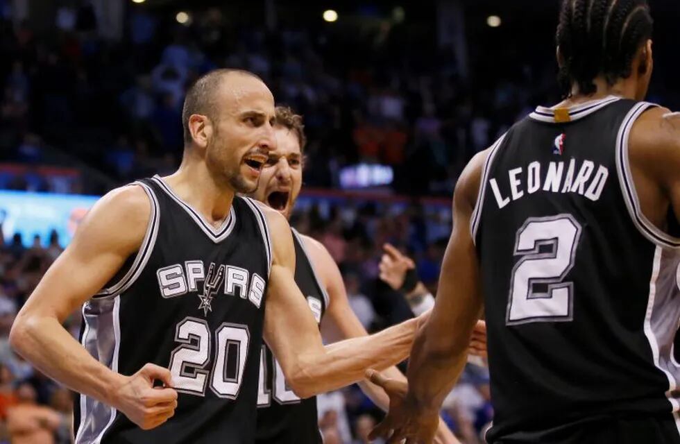 San Antonio Spurs guard Manu Ginobili (20) and center Pau Gasol, center, celebrate with teammate Kawhi Leonard (2) after a basket with 5.8 second left by Leonard in the fourth quarter of an NBA basketball game in Oklahoma City, Friday, March 31, 2017. Leo