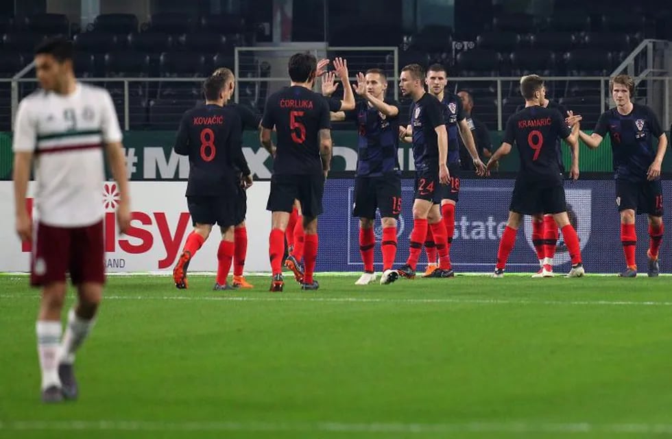 ARLINGTON, TX - MARCH 27: Croatia celebrates a goal by Ivan Rakitic of Croatia on a penalty kick in the second half of an international friendly match agaisnt Mexico at AT&T Stadium on March 27, 2018 in Arlington, Texas.   Richard Rodriguez/Getty Images/AFP\n== FOR NEWSPAPERS, INTERNET, TELCOS & TELEVISION USE ONLY ==