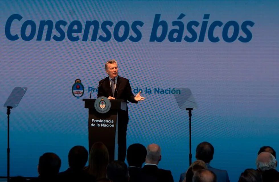 Argentina's President Mauricio Macri delivers a speech at the Kirchner Cultural Center in Buenos Aires, on October 30, 2017.\nMacri puts into debate a plan to deepen his liberal reforms, before politicians, businessmen and trade unionists. / AFP PHOTO / EITAN ABRAMOVICH