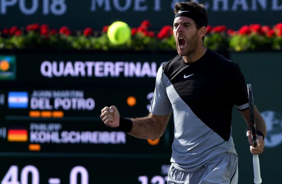 INDIAN WELLS, CA - MARCH 16: Juan Martin Del Potro of Argentina reacts to match point over Philipp Kohlschreiber of Germany during the BNP Paribas Open at the Indian Wells Tennis Garden on March 16, 2018 in Indian Wells, California.   Harry How/Getty Images/AFP\n== FOR NEWSPAPERS, INTERNET, TELCOS & TELEVISION USE ONLY ==