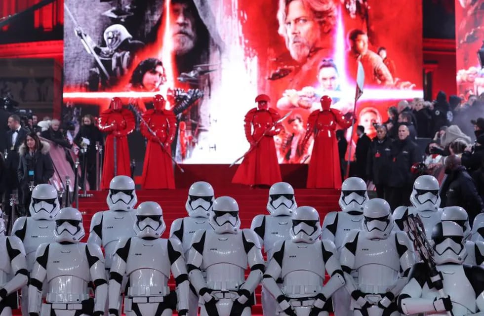 (FILES) This file photo taken on December 12, 2017 shows Stormtrooopers and Praetorian guards posing on the red carpet for the European Premiere of \