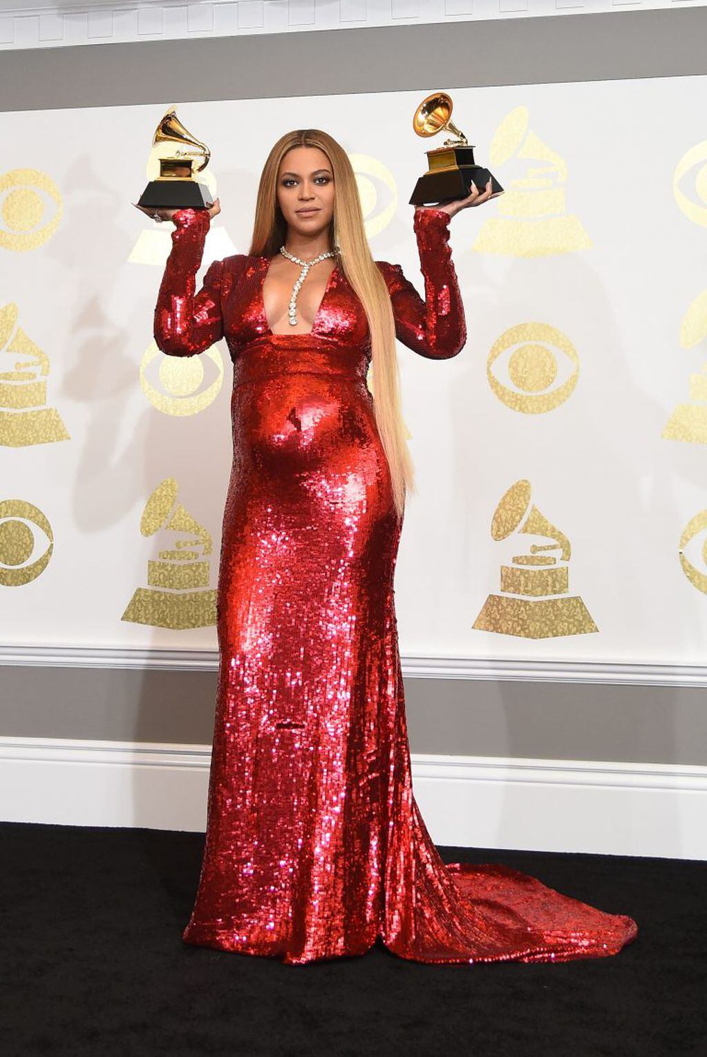 Singer Beyonce poses with her Grammy trophies in the press room during the 59th Annual Grammy music Awards on February 12, 2017, in Los Angeles, California.  / AFP PHOTO / Robyn BECK