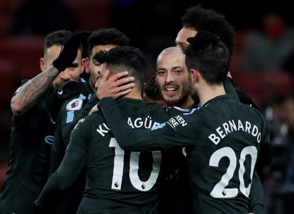 Soccer Football - Premier League - Arsenal vs Manchester City - Emirates Stadium, London, Britain - March 1, 2018   Manchester City's David Silva celebrates scoring their second goal with team mates              REUTERS/David Klein    EDITORIAL USE ONLY. No use with unauthorized audio, video, data, fixture lists, club/league logos or "live" services. Online in-match use limited to 75 images, no video emulation. No use in betting, games or single club/league/player publications.  Please contact your account representative for further details.