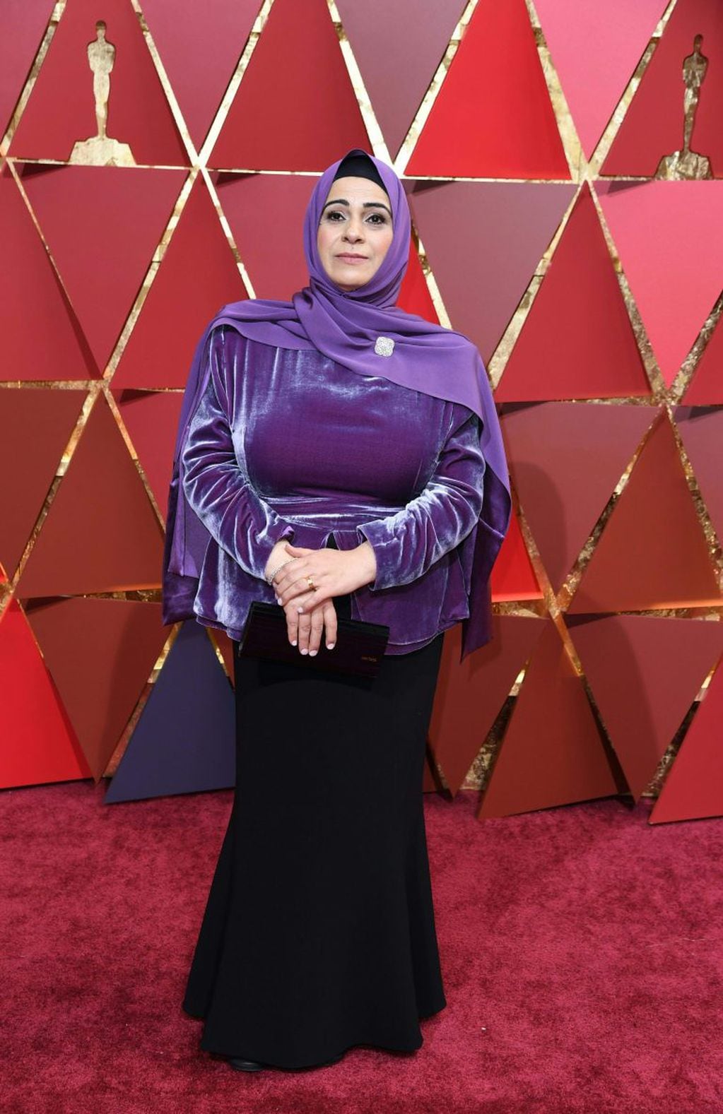 Syrian refugee Hala Kamil, subject from the Documentary Short "Watani: My Homeland," arrives on the red carpet for the 89th Oscars on February 26, 2017 in Hollywood, California.  / AFP PHOTO / ANGELA WEISS