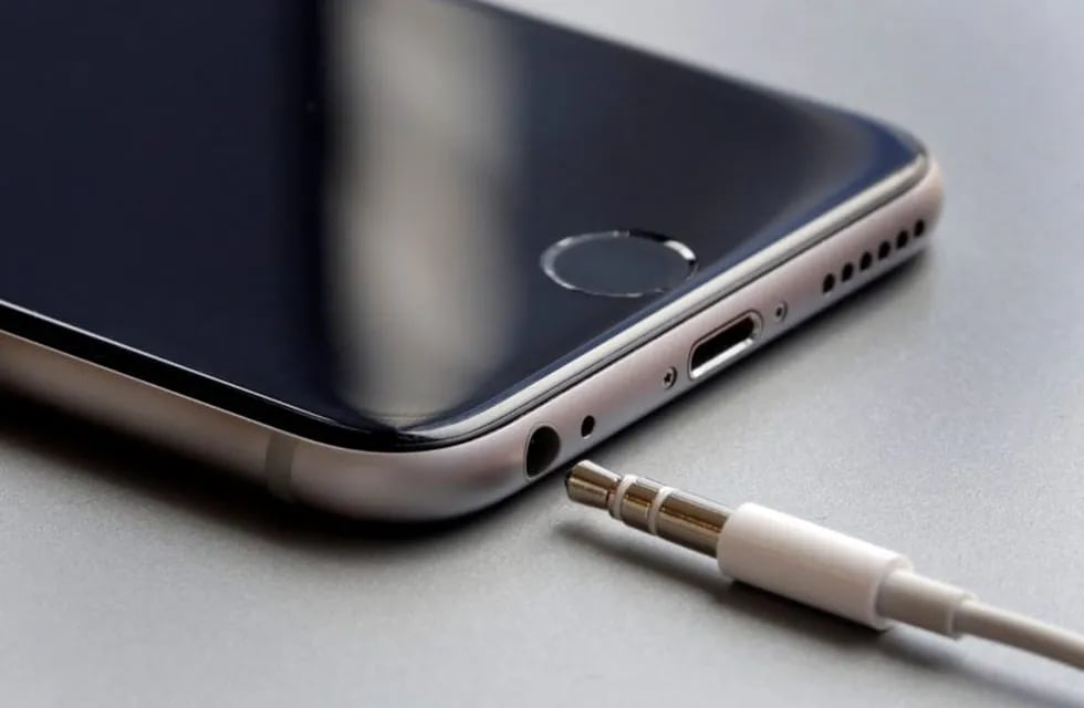 This Sept. 2, 2016, photo shows the earphone jack and charging port on an Apple iPhone 6, in New York. Apple is getting ready to unveil new iPhones on Wednesday, Sept. 7. With experts predicting few big changes from last year's models, speculation has foc