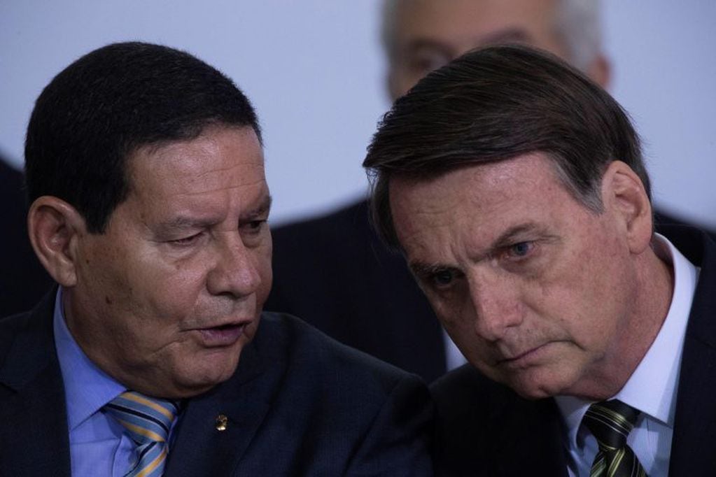 Hamilton Mourao y Jair Bolsonaro. (Foto: EFE/Joédson Alves)