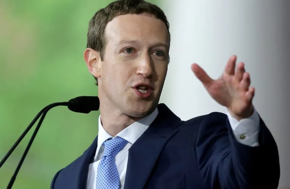 FILE - In this May 25, 2017, file photo, Facebook CEO and Harvard dropout Mark Zuckerberg delivers the commencement address at Harvard University commencement exercises in Cambridge, Mass. Zuckerberg apologized on Oct. 10, 2017, for showcasing Facebook’s virtual reality capability with a tour of hurricane ravaged Puerto Rico.(AP Photo/Steven Senne, File)