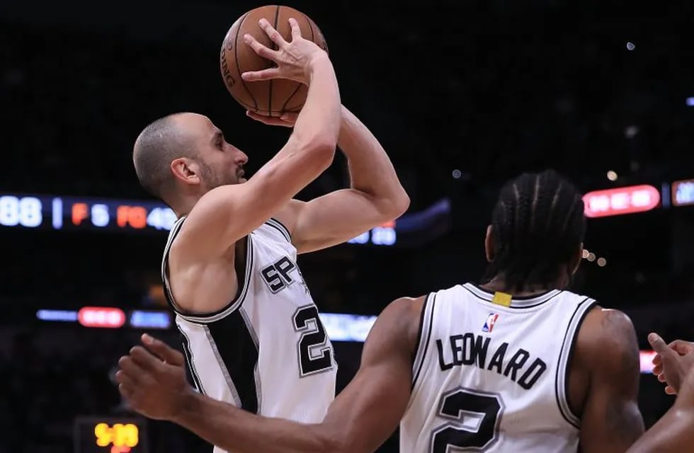 SAN ANTONIO, TX - MAY 03: Manu Ginobili #20 of the San Antonio Spurs attempts a shot against the Houston Rockets during Game Two of the NBA Western Conference Semi-Finals at AT&T Center on May 3, 2017 in San Antonio, Texas. NOTE TO USER: User expressly acknowledges and agrees that, by downloading and or using this photograph, User is consenting to the terms and conditions of the Getty Images License Agreement.   Ronald Martinez/Getty Images/AFPn== FOR NEWSPAPERS, INTERNET, TELCOS & TELEVISION USE ONLY ==