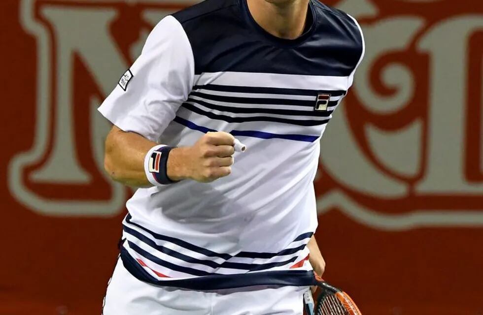 Diego Schwartzman of Argentina reacts after a point against Steve Johnson of the US during their men's singles quarter-final match at the Japan Open tennis tournament in Tokyo on October 6, 2017. / AFP PHOTO / Toru YAMANAKA