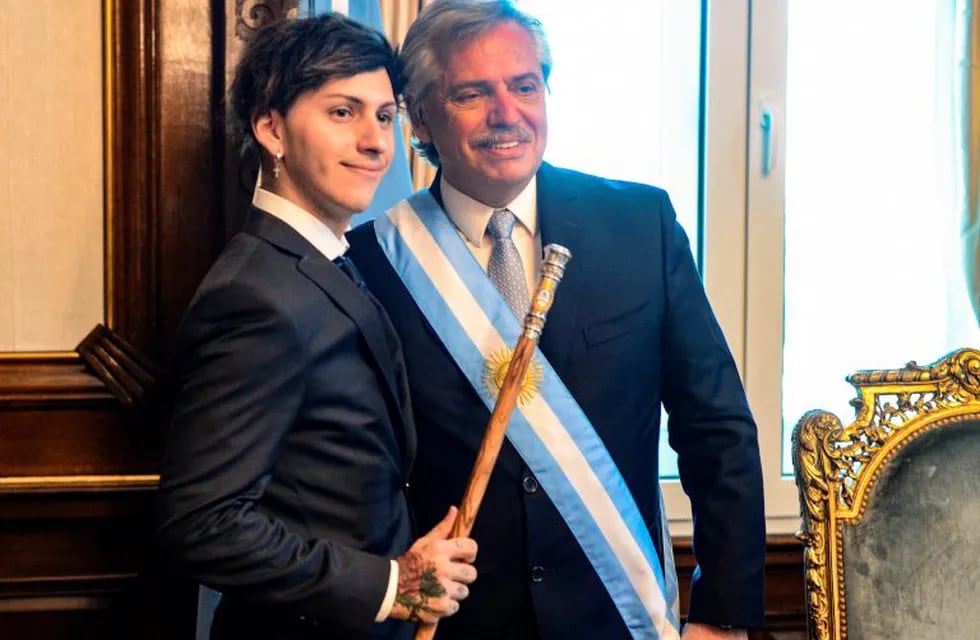 Handout picture released by the Argentine Presidency showing Argentina's new president Alberto Fernandez (R) posing with his son Estanislao Fernandez at Casa Rosada presidential palace, after his inauguration ceremony at the Congress in Buenos Aires on December 10, 2019. (Photo by HO / Argentinian Presidency / AFP) / RESTRICTED TO EDITORIAL USE - MANDATORY CREDIT \