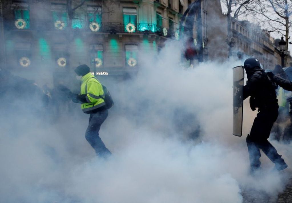 Las imágenes de los disturbios recorrieron los principales medios del mundo (REUTERS)