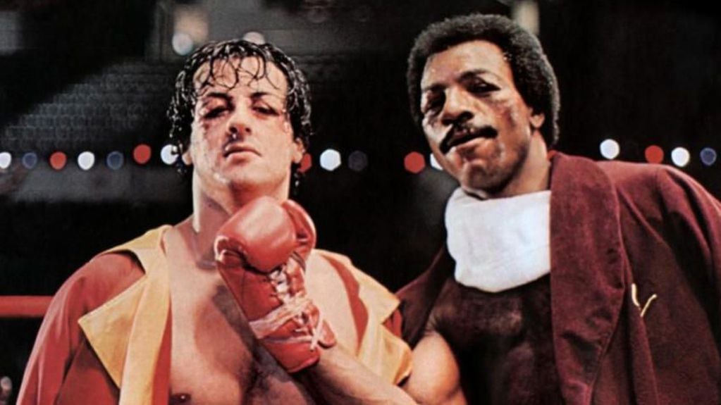 Carl Weathers junto a Sylvester Stallone. En la saga Rocky, sus personajes comenzaron como rivales y terminaron como amigos.
