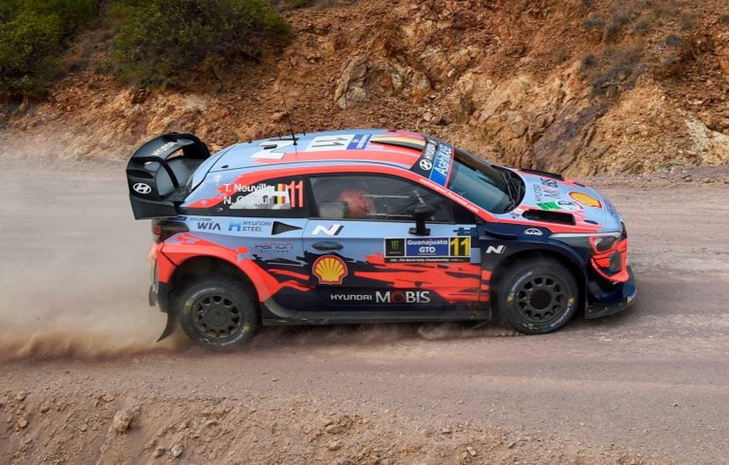 Belgian rally driver Thierry Neuville Belgian co-driver Nicolas Gilsoul of the Hyundai i20 Coupe WRC drive, compete during the second stage of the FIA World Rally Championship in Silao, Guanajuato State, Mexico on March 13, 2020. (Photo by ALFREDO ESTRELLA / AFP)
