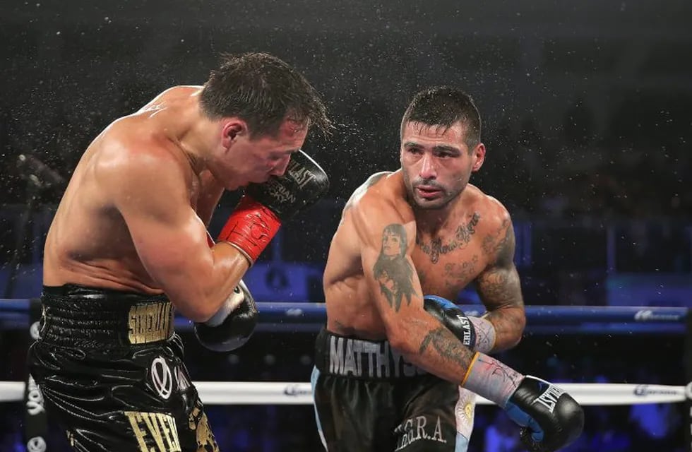 VERONA , NY - APRIL 18: Lucas Matthysse (R) throws a right cross to the head of Ruslan Provodnikov at the Turning Stone Resort Casino on April 18, 2015 in Verona, New York. Matthysee won the 12 round bout by scores of 114-114, 115-113 and 115-113.   Alex 