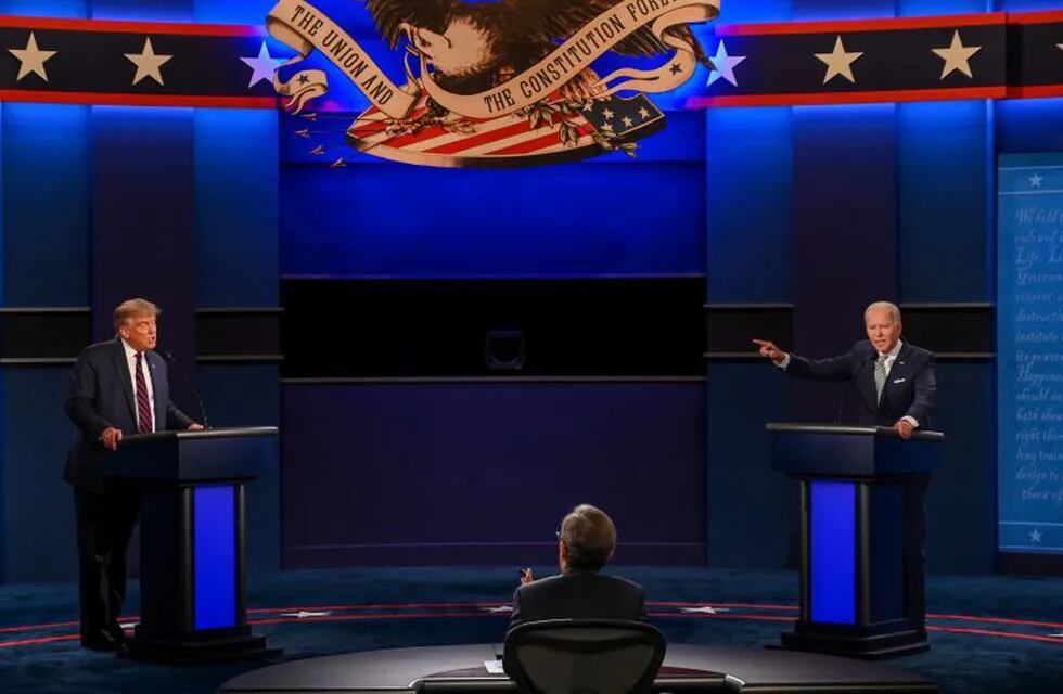 (FILES) In this file photo taken on September 29, 2020 US President Donald Trump (L) and Democratic Presidential candidate and former US Vice President Joe Biden exchange arguments during the first presidential debate at Case Western Reserve University and Cleveland Clinic in Cleveland, Ohio. - The presidential debate between Democratic Presidential candidate and former US Vice President Joe Biden and US President Donald Trump scheduled for October 15 has been cancelled by the Commission on Presidential Debates, US media reported on October 9, 2020. (Photo by Jim WATSON / AFP)