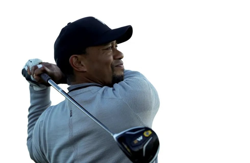 FILE - In this Jan. 25, 2017, file photo, Tiger Woods watches his tee shot on the fifth hole of the north course during the Pro-Am event of the Farmers Insurance Open golf tournament, in San Diego. Police say golf great Tiger Woods has been arrested on a DUI charge in Florida. The Palm Beach County Sheriff's Office says on its website that Woods was booked into a county jail around 7 a.m. on Monday, May 29, 2017. (AP Photo/Gregory Bull, File)