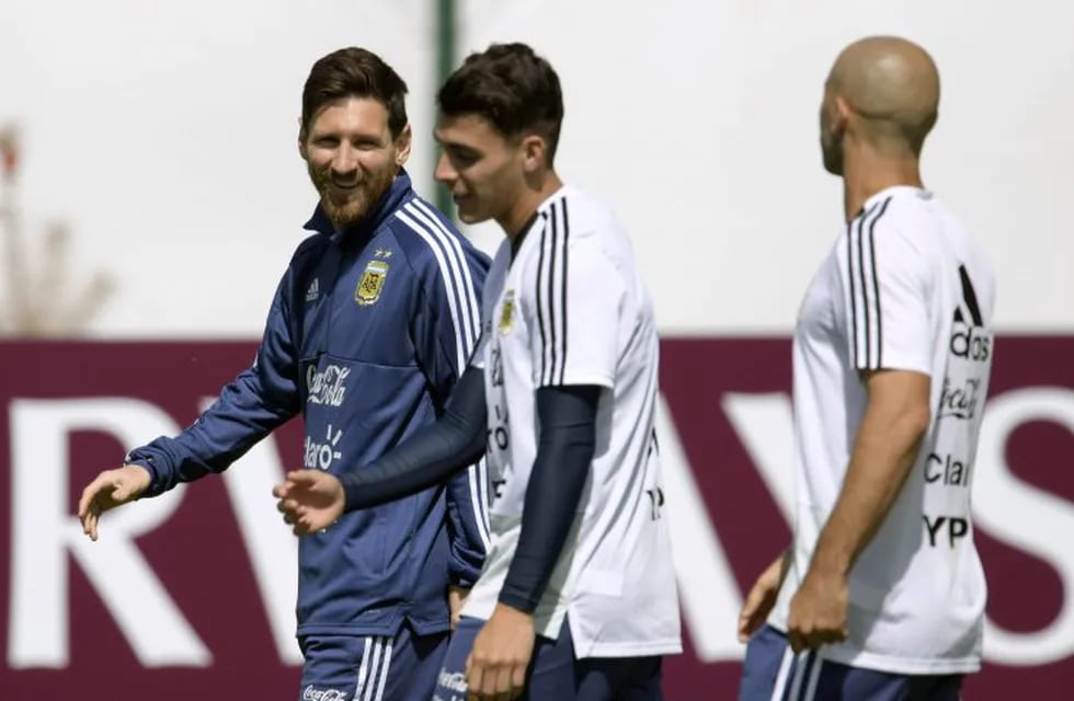 Kichán Pavón, con Messi y Mascherano.