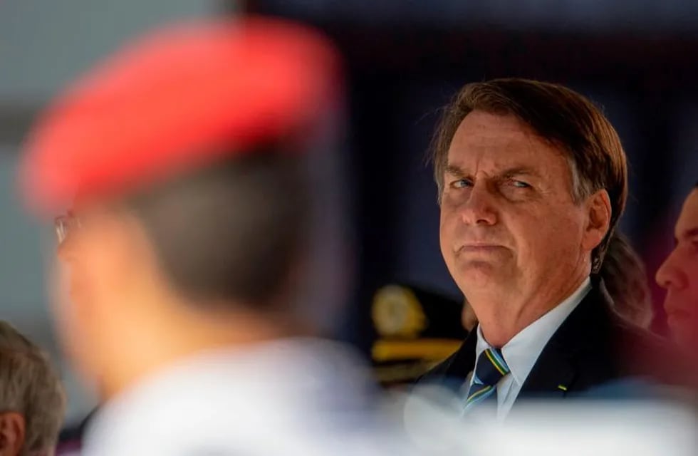 (FILES) In this file photo taken on May 06, 2019, Brazilian President Jair Bolsonaro attends a ceremony marking the 130th anniversary of the Rio de Janeiro Military School (CMRJ), in Rio de Janeiro, Brazil. - Volkswagen said on September 23, 2020 it had signed a deal with prosecutors to compensate former workers at the company's Brazil unit for rights violations committed during the South American country's military dictatorship. (Photo by Mauro Pimentel / AFP)