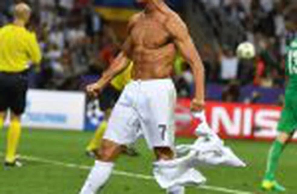 (FILES) This file photo taken on May 28, 2016 shows Real Madrid's Portuguese forward Cristiano Ronaldo celebrating after scoring during the penalty shoot-out in the UEFA Champions League final football match between Real Madrid and Atletico Madrid at San 