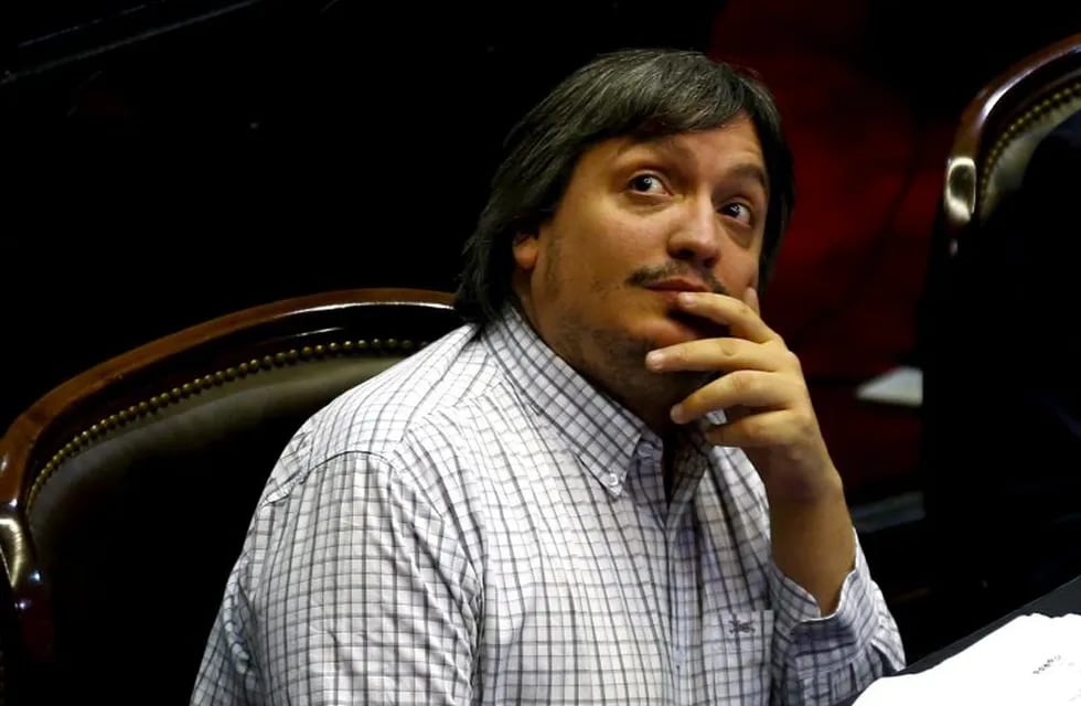 Maximo Kirchner (C), lawmaker of the opposition Victory Front and son of former Argentine President Cristina Fernandez de Kirchner, looks up as lawmakers debate the approval of a settlement with creditors over the country's defaulted debt at the Lower Hou