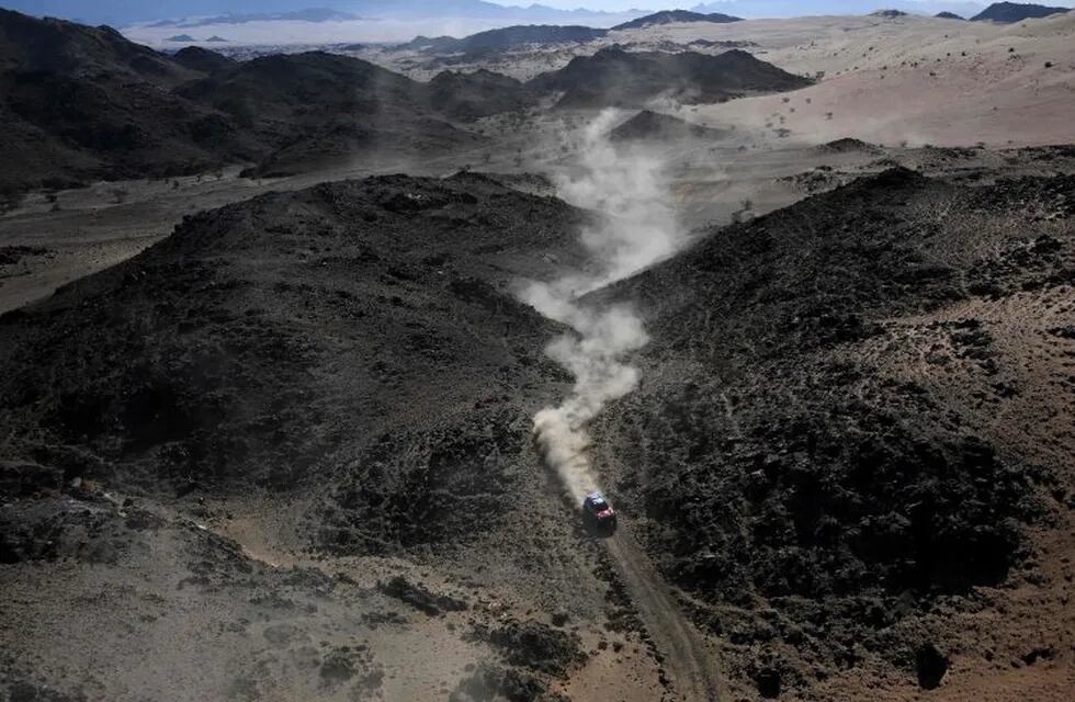 Mini's driver Jakub Przygonski of Poland and his co-driver Timo Gottschalk of Germany  compete during the Stage 1 of the Dakar 2020 between Jeddah and Al Wajh, Saudi Arabia, on January 5, 2020. (Photo by FRANCK FIFE / AFP)