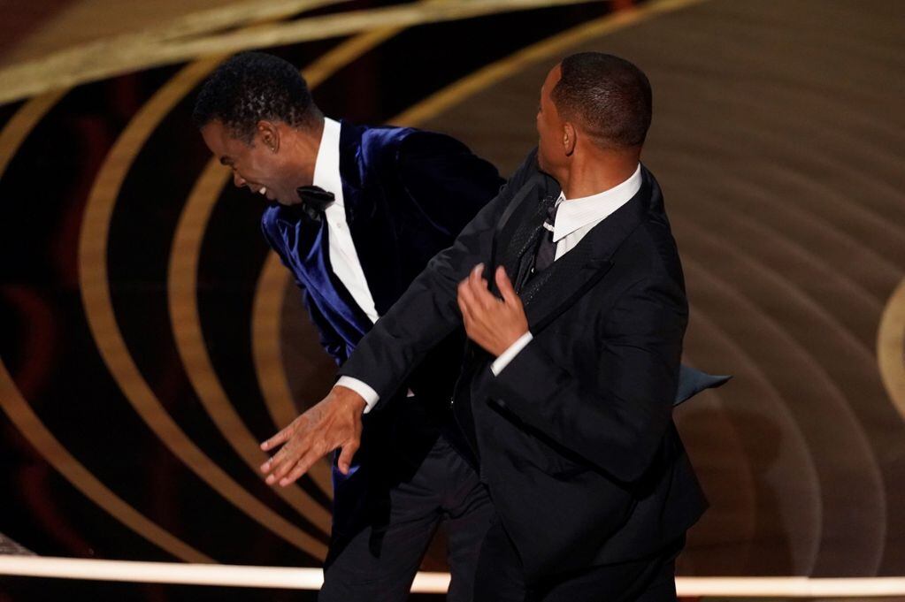 Will Smith y Chris Rock en los Premios Oscar 2022